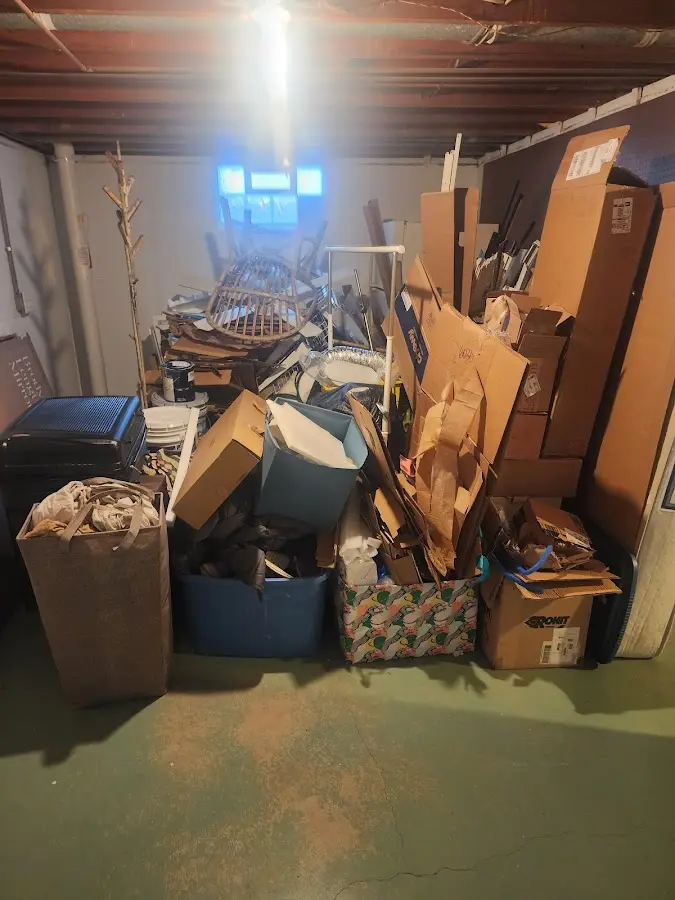 Roll-off dumpster container at job site for Yard Waste Dumpster Rental in Fulton